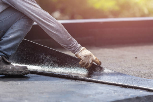 Professional Emergency Waterproofing technician working in Greendale, IN